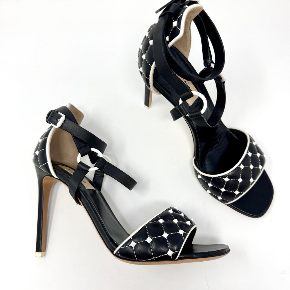 Valentino Garavani Quilted Rockstud Ankle Strap Sandals in black and white